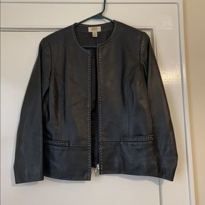 Vintage Talberts petite leather jacket with white stitching trim. Zips